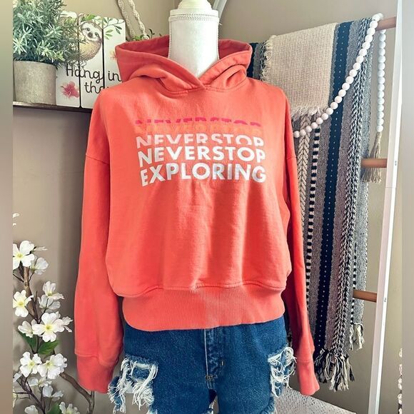 The North Face Emberglow Orange Never Stop Exploring Cropped Hooded Sweatshirt - Picture 1 of 9